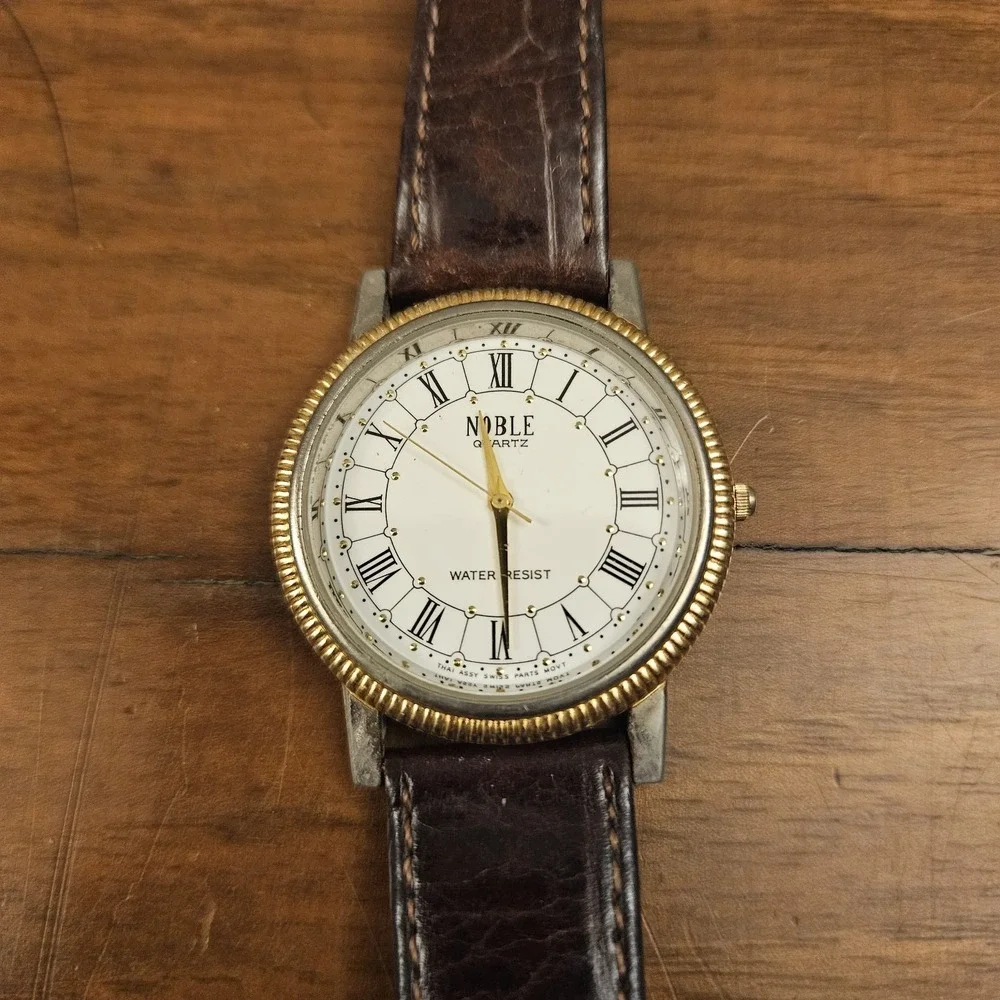 Noble Womens Silver And Gold Tone Leather Band Analog Quartz Watch Needs Battery